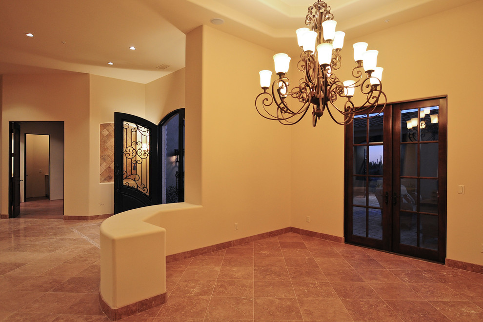 Large traditional kitchen/dining room in Phoenix with beige walls, travertine flooring and no fireplace.