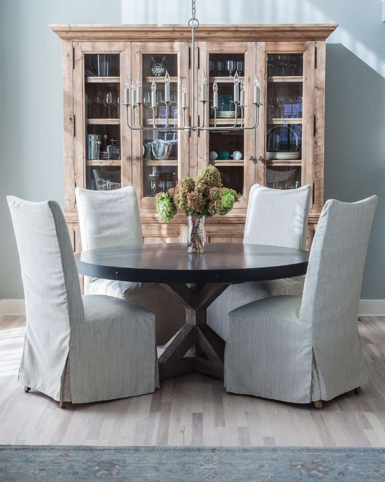 Inspiration for a transitional dining room remodel in Newark with gray walls