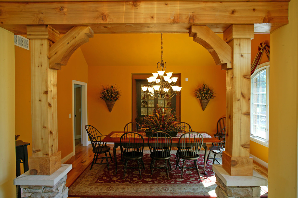 Example of a mountain style dining room design in Cincinnati