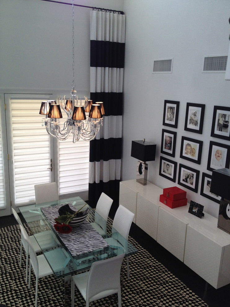 Inspiration for a contemporary great room remodel in Las Vegas with white walls