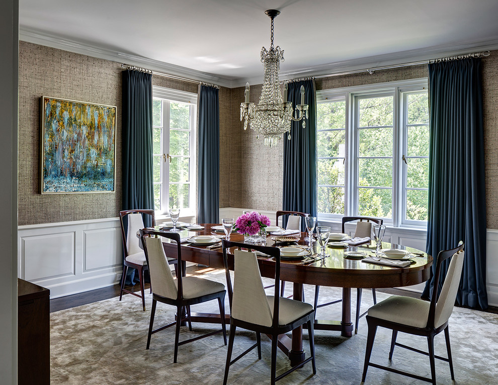 This is an example of a medium sized traditional dining room in New York with beige walls, dark hardwood flooring and brown floors.