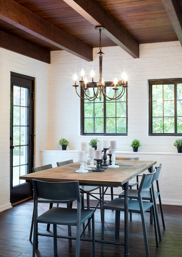 Photo of a large farmhouse enclosed dining room in Chicago with white walls, dark hardwood flooring, no fireplace and brown floors.
