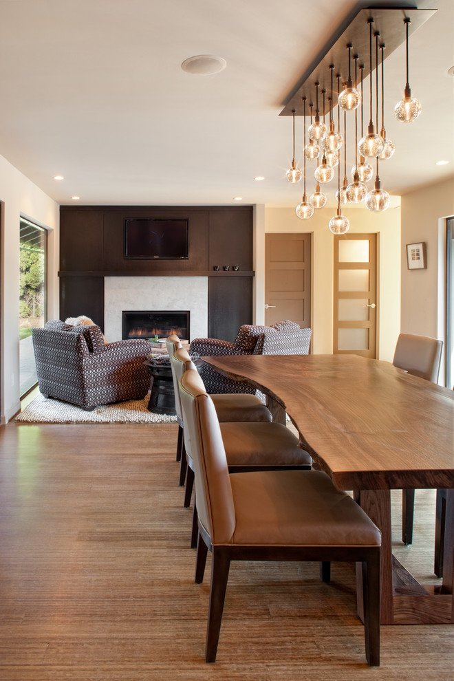 Design ideas for a contemporary open plan dining room in Portland.