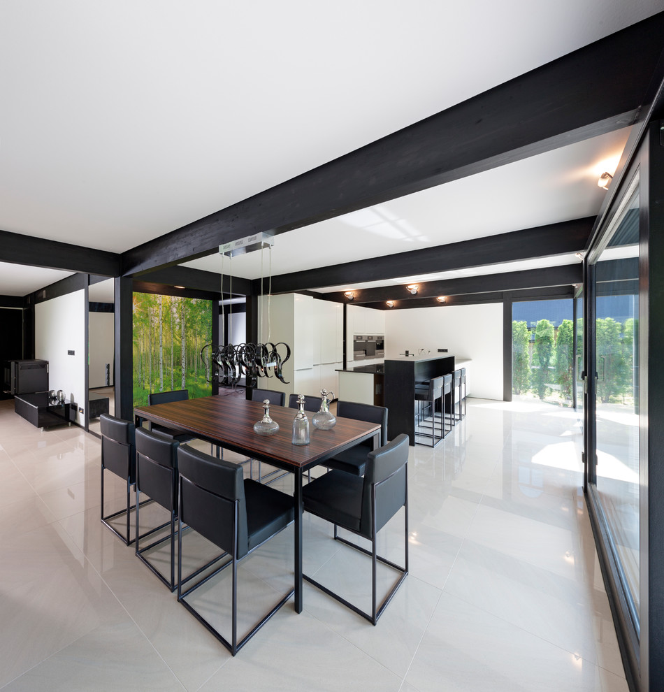 Inspiration for a large contemporary open plan dining room in Stuttgart with white walls.