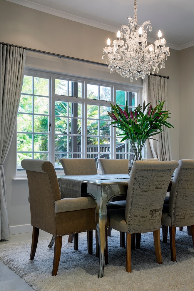 Example of a trendy dining room design in London