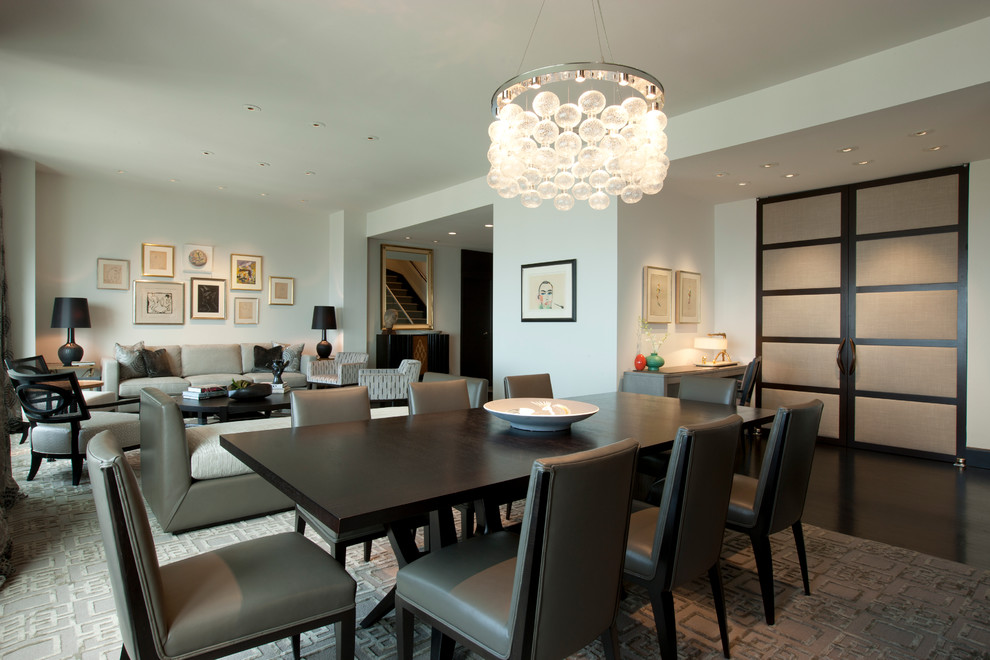 Trendy dark wood floor dining room photo in Chicago with white walls
