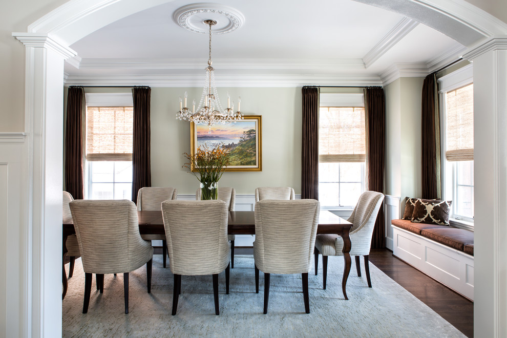 Photo of a traditional enclosed dining room in DC Metro with beige walls and dark hardwood flooring.