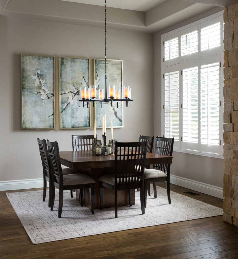 This is an example of a medium sized classic enclosed dining room in Denver with beige walls, medium hardwood flooring, brown floors and no fireplace.