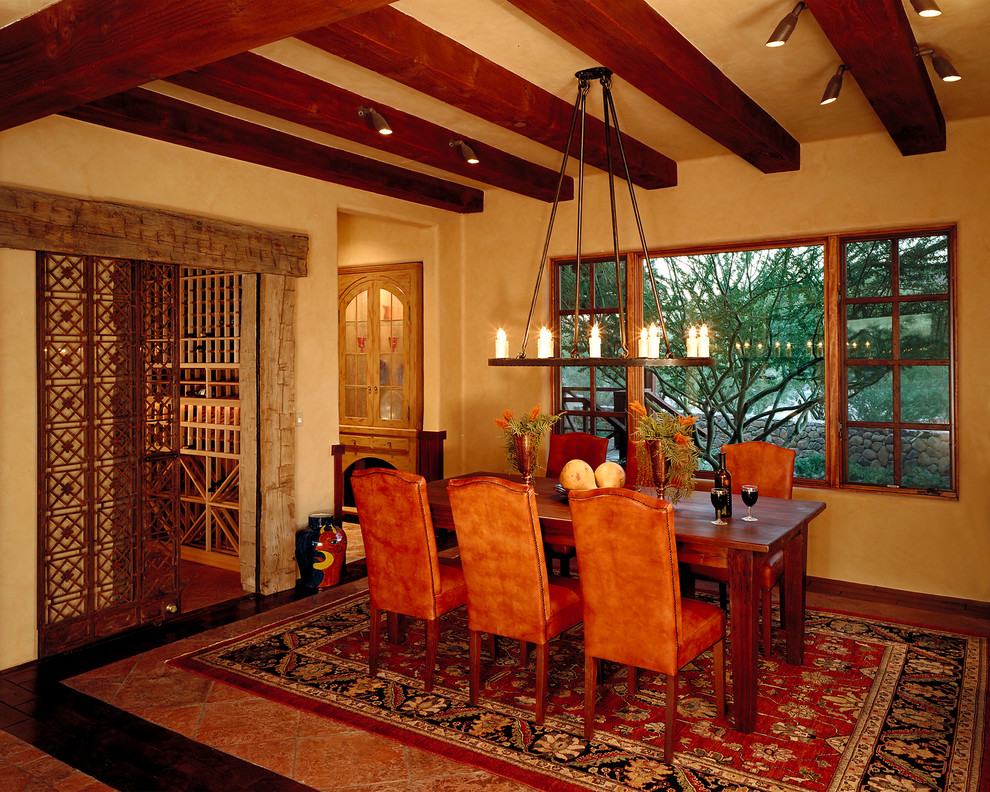 Mediterranean dining room in Phoenix with beige walls.