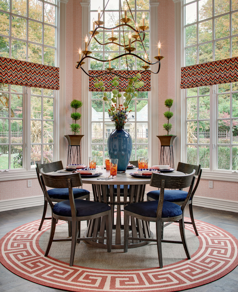 Inspiration for a medium sized traditional kitchen/dining room in New York with orange walls, no fireplace and dark hardwood flooring.