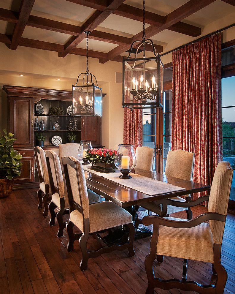 Elegant dark wood floor dining room photo in Phoenix with beige walls