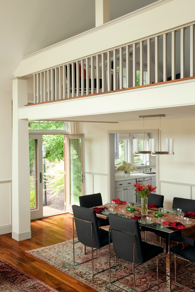 Inspiration for a timeless medium tone wood floor great room remodel in Other with white walls