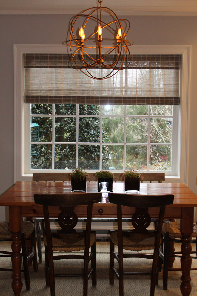 Photo of a medium sized classic kitchen/dining room in New York with dark hardwood flooring and grey walls.