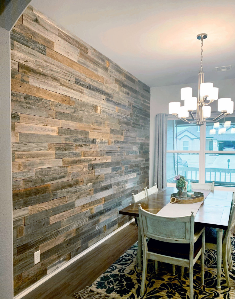 Idées déco pour une salle à manger ouverte sur la cuisine moderne de taille moyenne avec un mur gris.