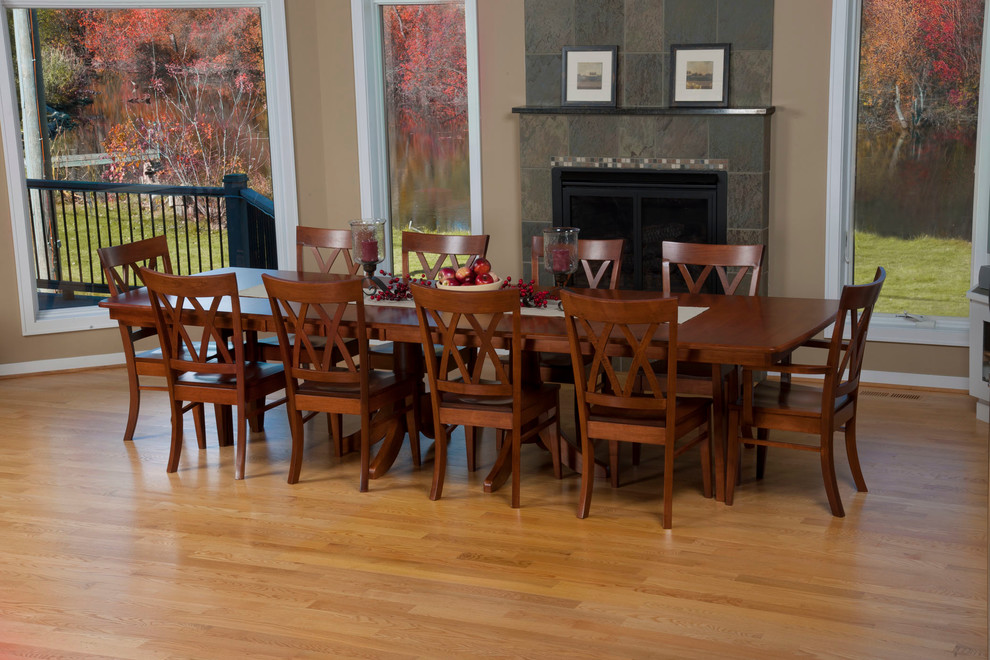 Photo of a large traditional kitchen/dining room in Detroit with beige walls and medium hardwood flooring.