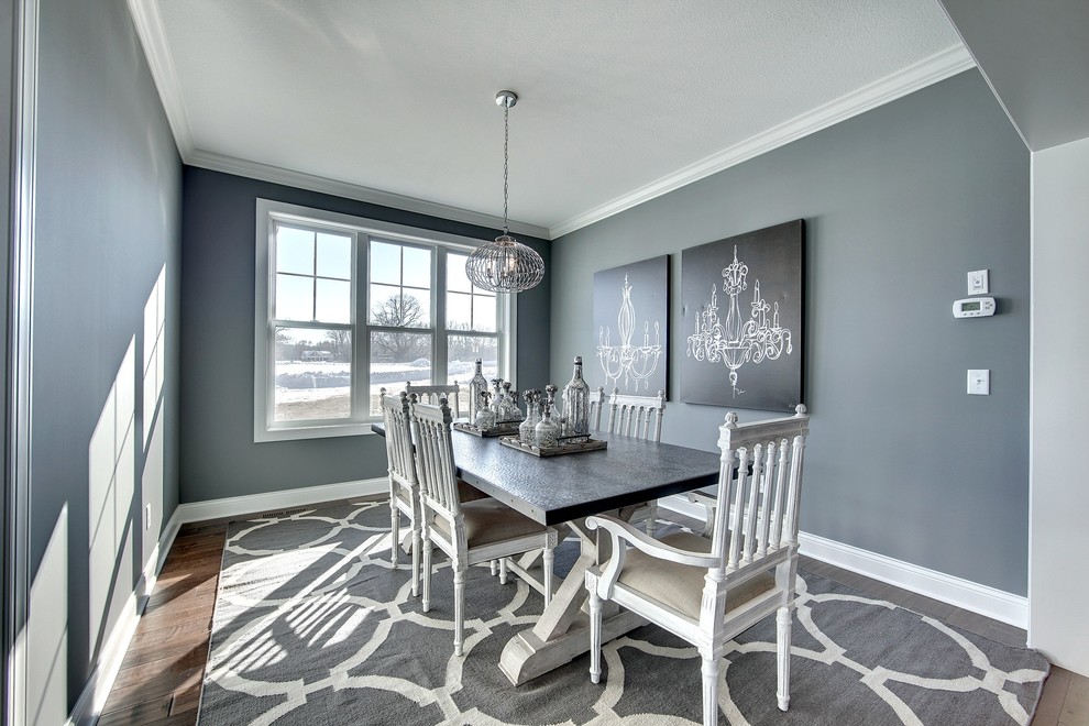 Photo of a large classic open plan dining room in Minneapolis with grey walls, dark hardwood flooring and no fireplace.