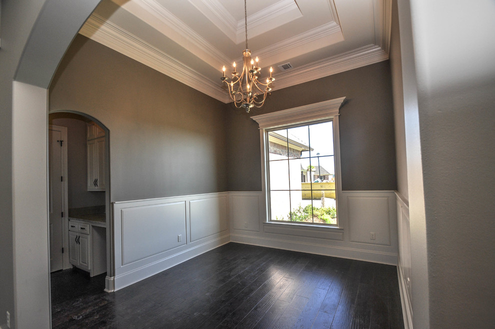 Kitchen/dining room combo - mid-sized traditional dark wood floor kitchen/dining room combo idea in New Orleans with gray walls and no fireplace