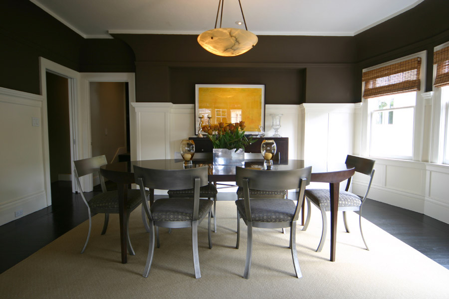 Inspiration for a mid-sized timeless dark wood floor enclosed dining room remodel in San Francisco with black walls and no fireplace
