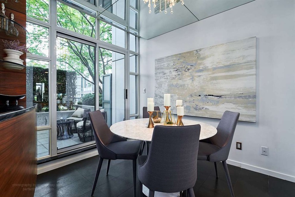 Design ideas for a modern dining room in Vancouver.