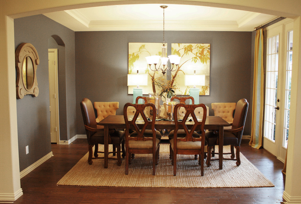 Elegant dark wood floor dining room photo in Dallas with gray walls