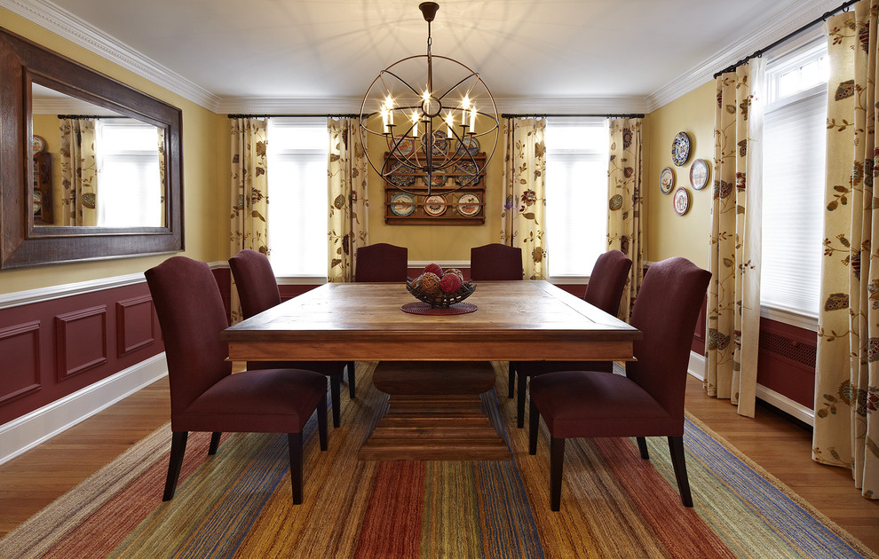 Example of an eclectic dining room design in DC Metro with multicolored walls