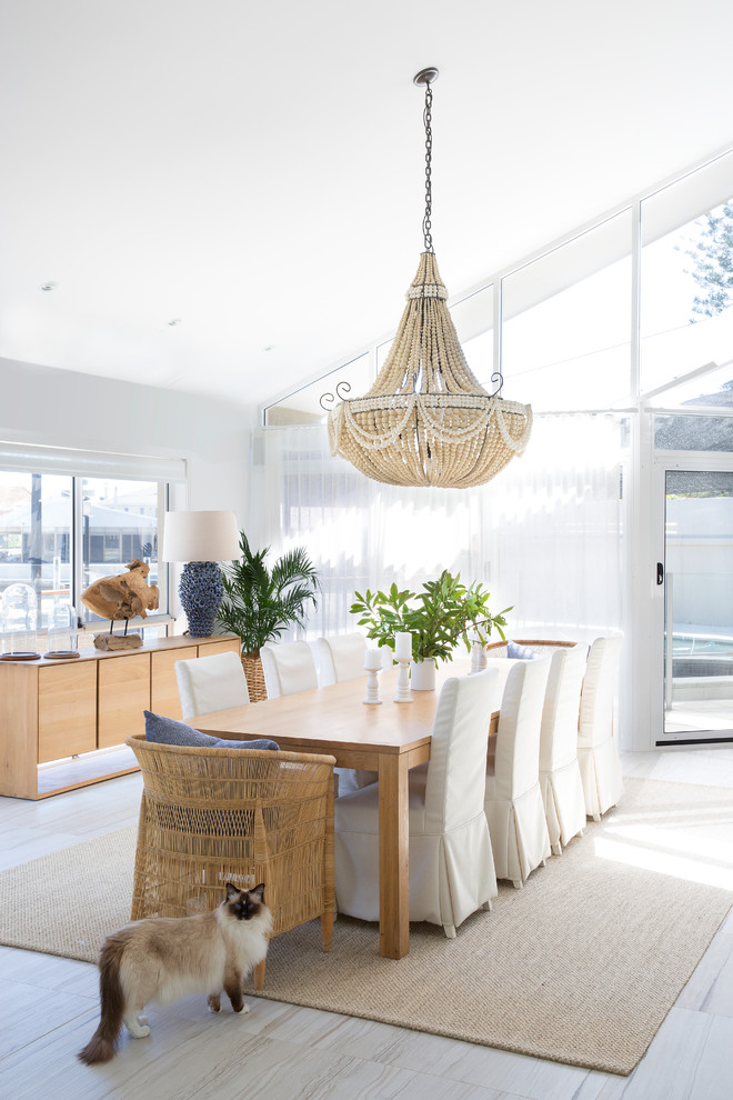Design ideas for a coastal dining room in Gold Coast - Tweed.