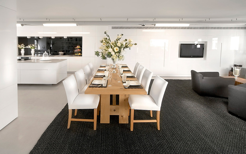 Photo of a contemporary open plan dining room in Other.