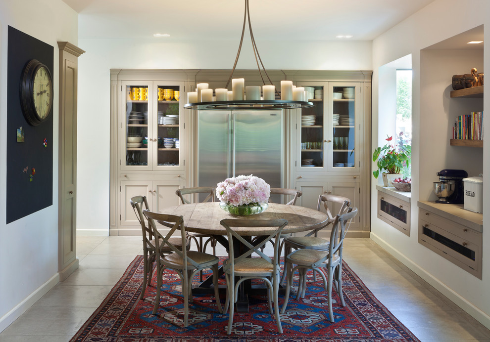 Elegant dining room photo in Other with white walls