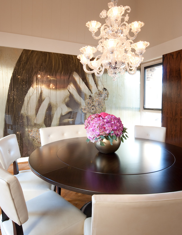 Inspiration for a modern medium tone wood floor dining room remodel in Miami with white walls and no fireplace