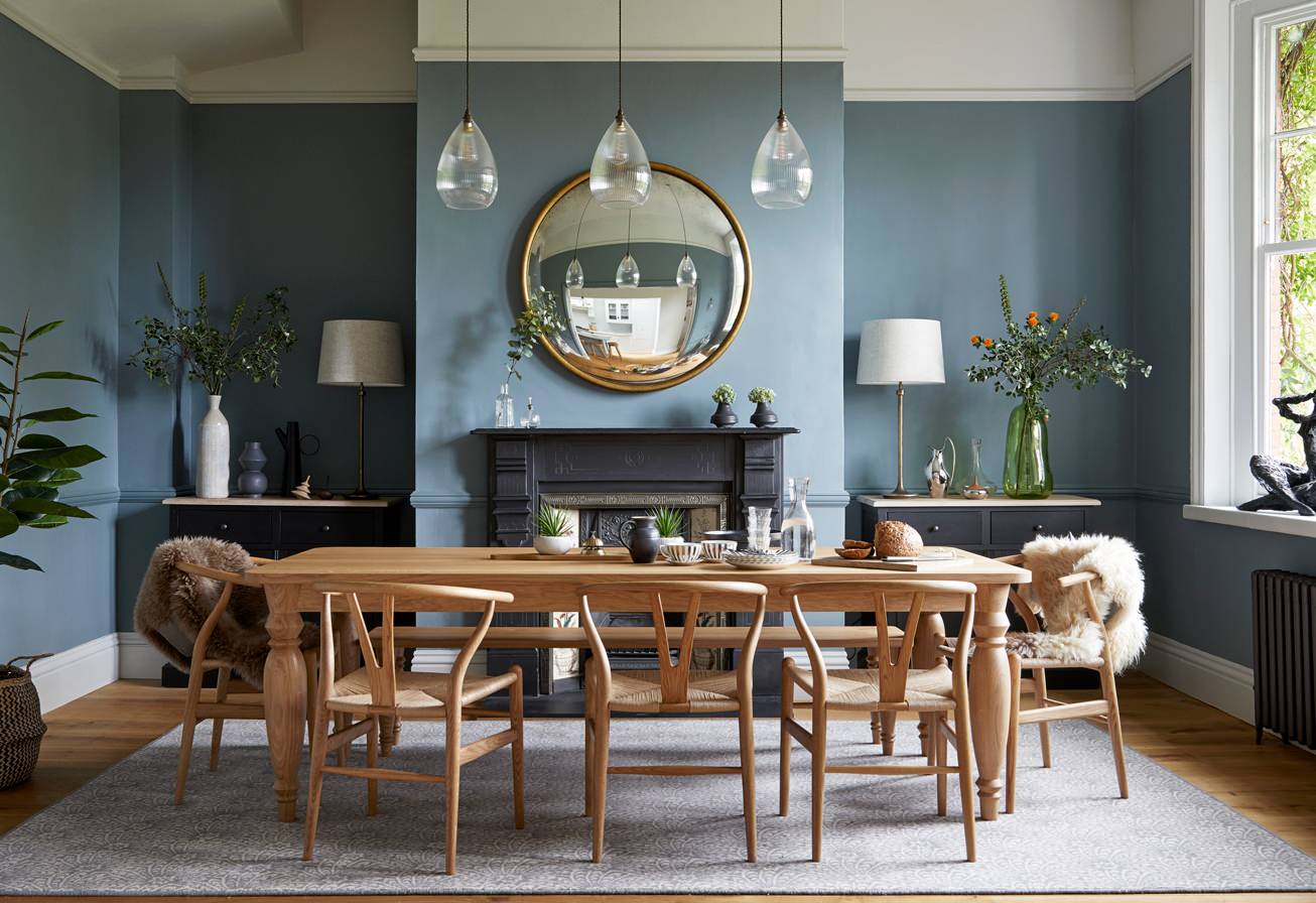 Pale blue wall and oak table