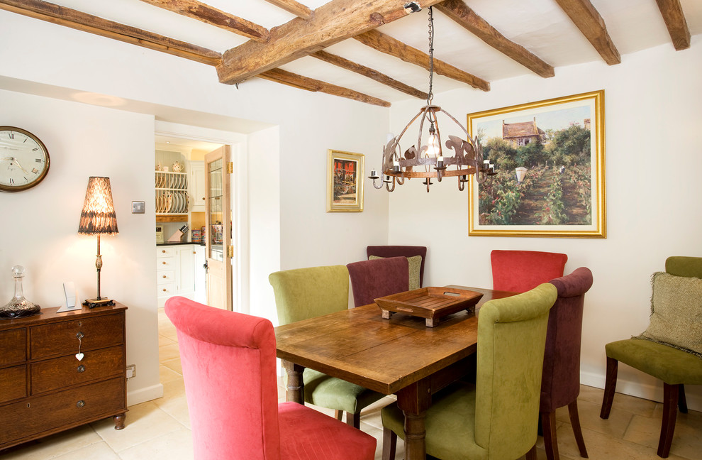 Small rural dining room in Oxfordshire with white walls.