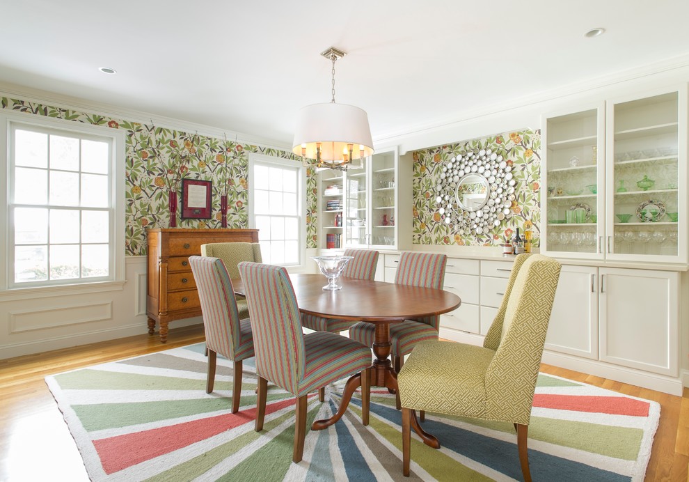 Enclosed dining room - large transitional medium tone wood floor enclosed dining room idea in Boston with no fireplace