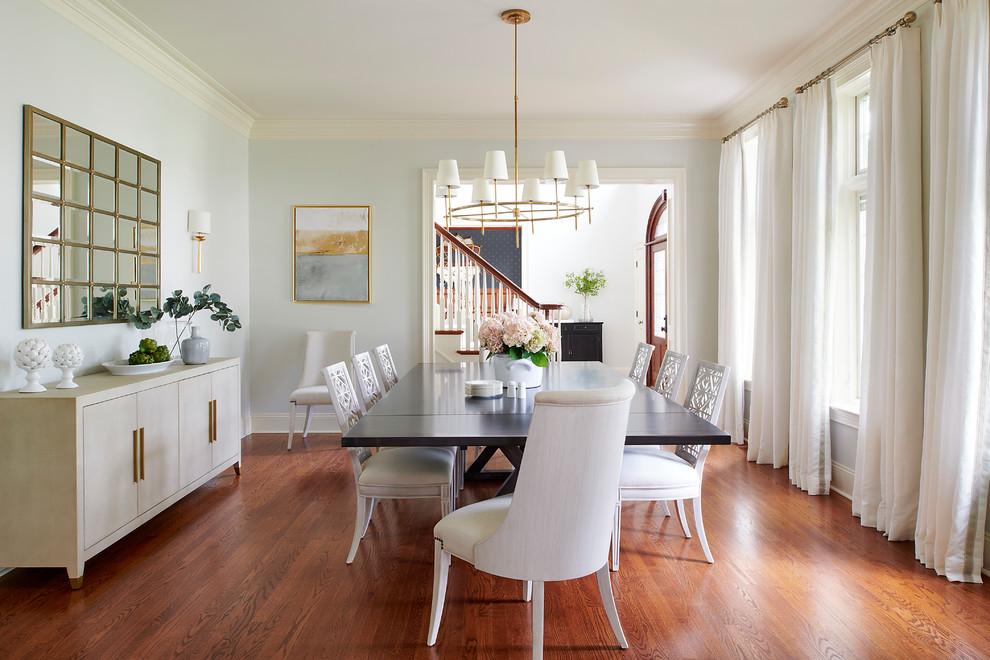 Inspiration for a traditional enclosed dining room in Philadelphia with medium hardwood flooring.