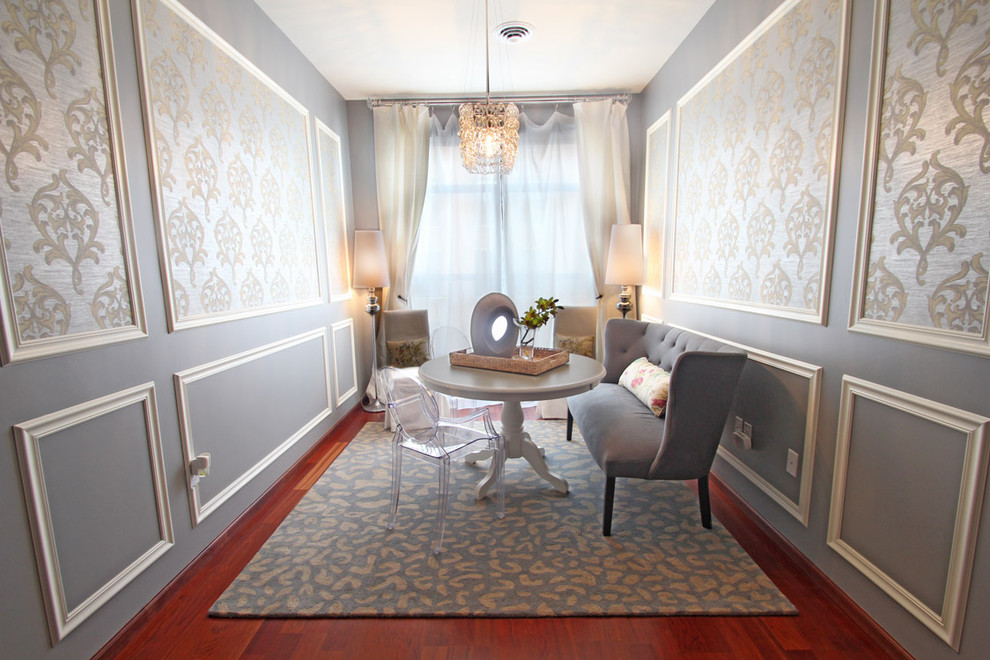 Mid-sized transitional medium tone wood floor dining room photo in Minneapolis with gray walls