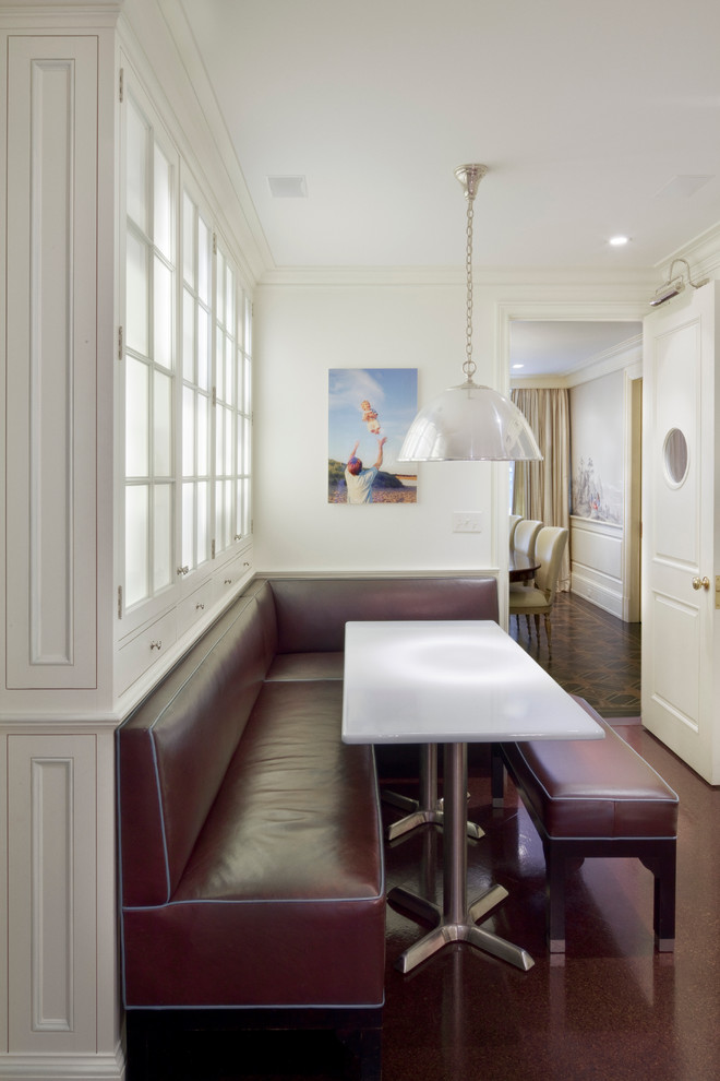 Design ideas for a traditional dining room in New York with white walls.