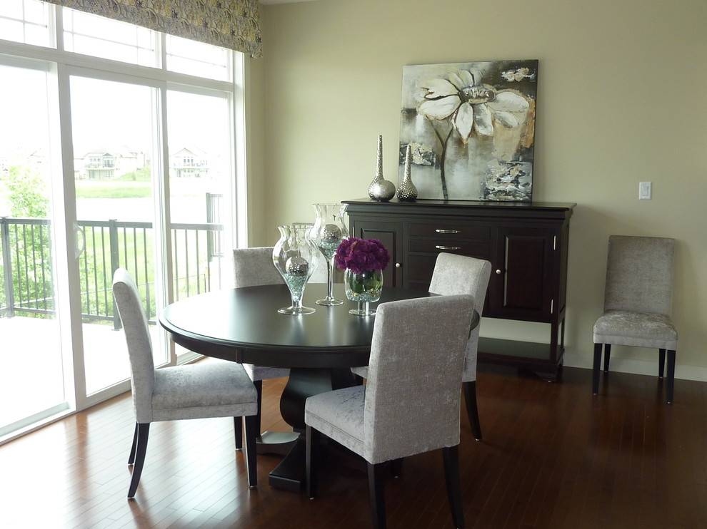 Example of a minimalist dining room design in Edmonton