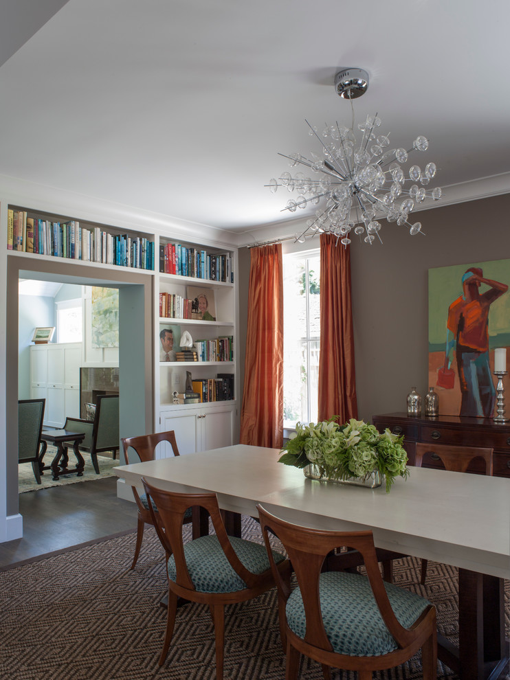Enclosed dining room - mid-sized transitional medium tone wood floor enclosed dining room idea in San Francisco with brown walls