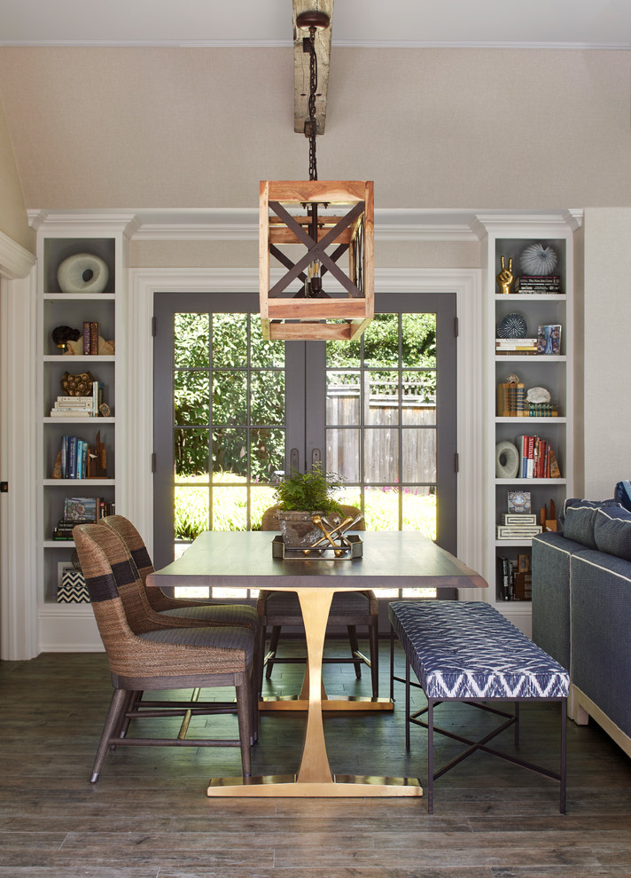 Photo of a beach style open plan dining room in New York with beige walls, dark hardwood flooring and brown floors.