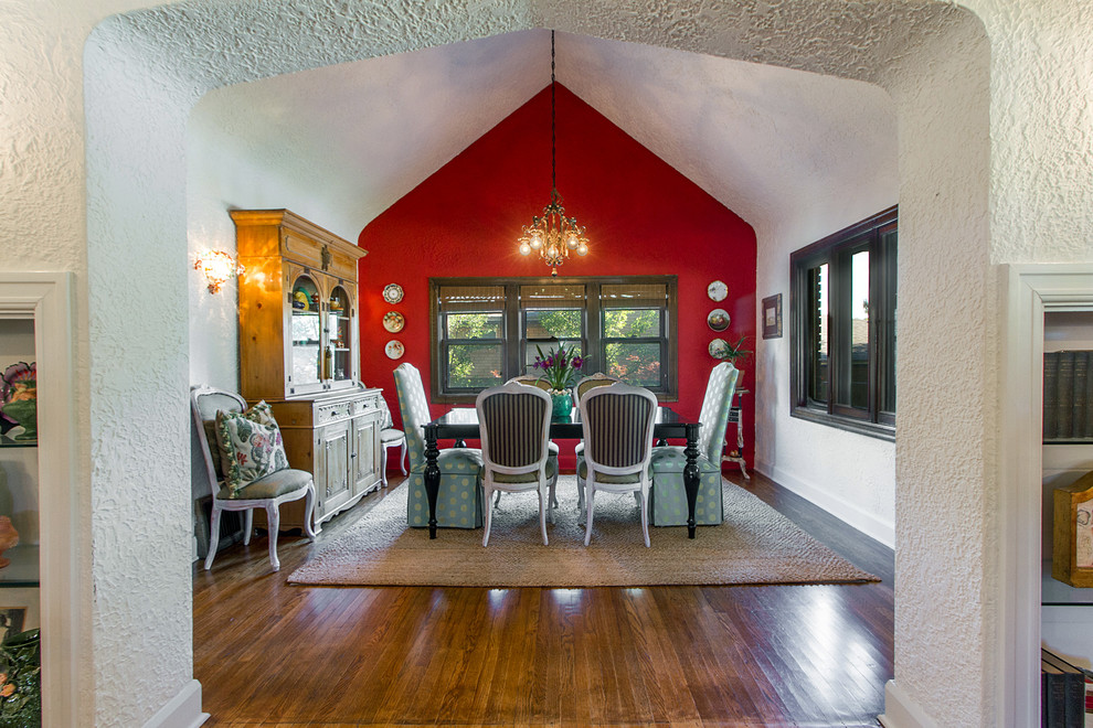 Example of a mid-sized eclectic medium tone wood floor kitchen/dining room combo design in Salt Lake City with red walls