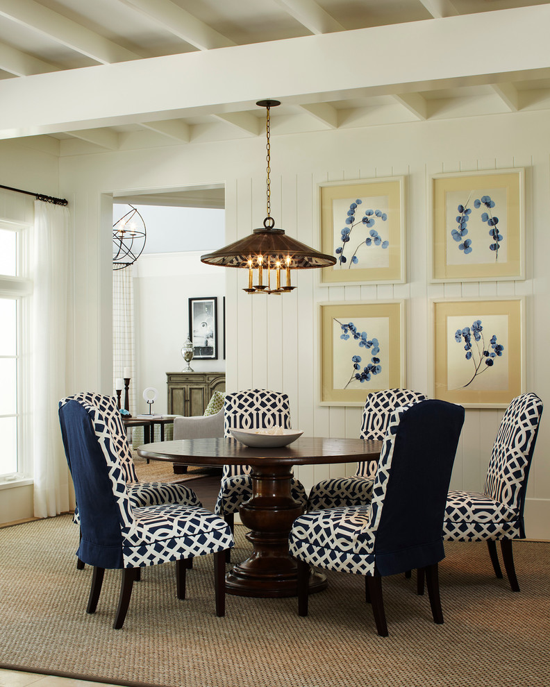 Enclosed dining room - mid-sized traditional enclosed dining room idea in Miami with white walls and no fireplace