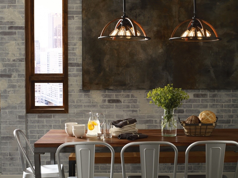Immagine di una sala da pranzo aperta verso la cucina industriale di medie dimensioni con pareti grigie e nessun camino
