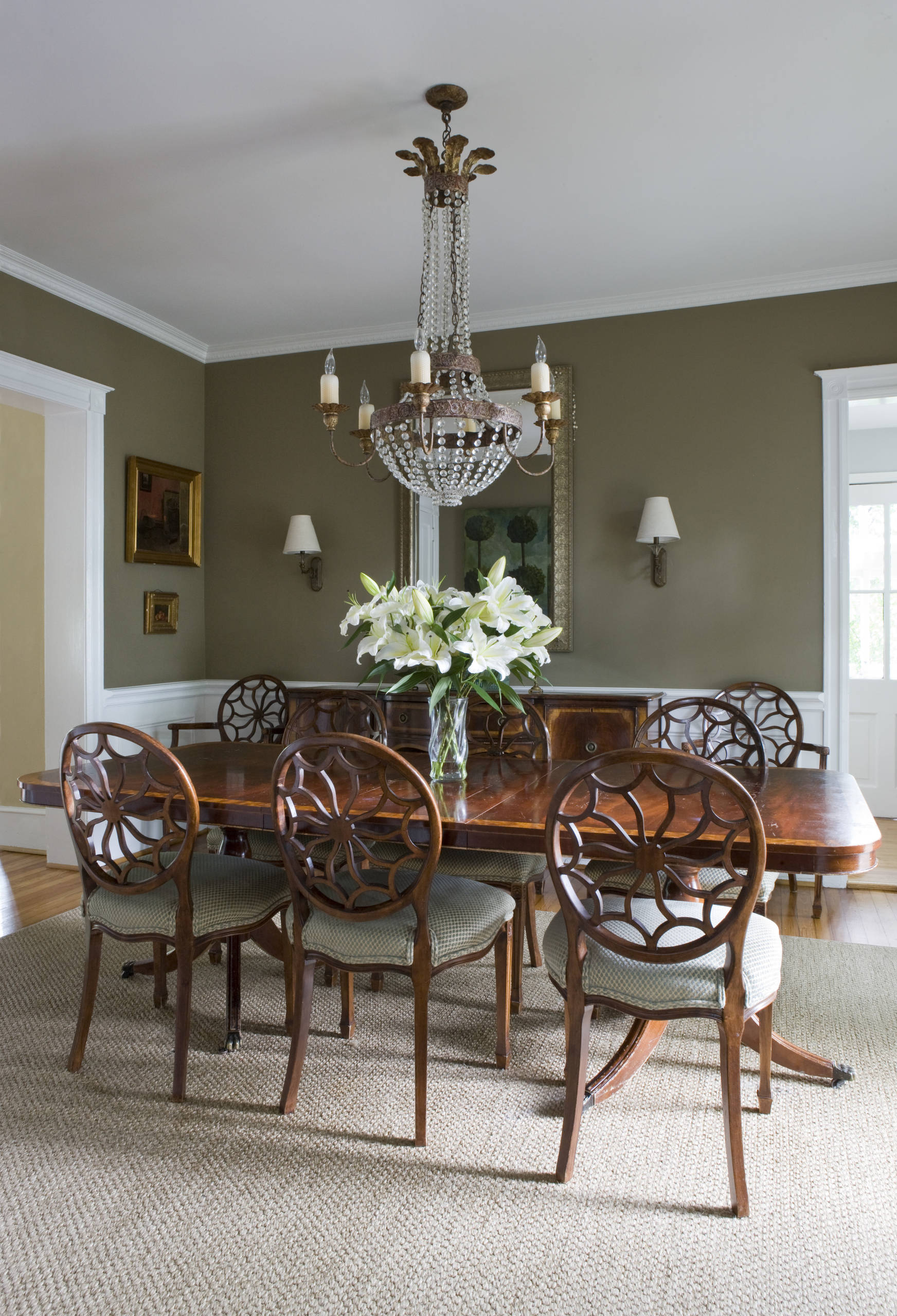 Olive Green Dining Room : Beautiful Dining Room With Olive And White Walls Ceiling Beams Hardwood Floor And Green Rug Furnished With Antique Dining Table Set And Piano Decorated With Palm Pot And Dry Branches Stock Photo / Olive green restaurant, ηράκλειο κρήτης.