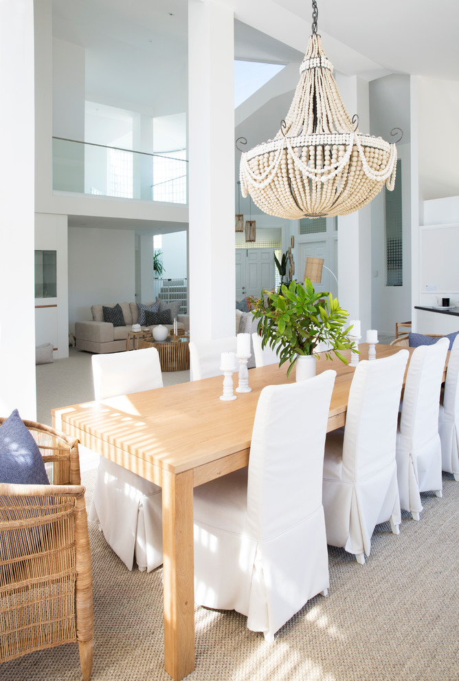 Photo of a large contemporary kitchen/dining room in Gold Coast - Tweed with white walls, porcelain flooring and grey floors.