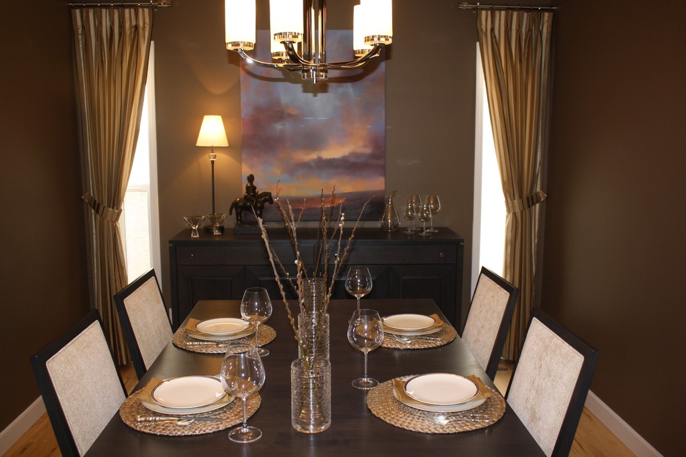 Example of a trendy dining room design in Calgary
