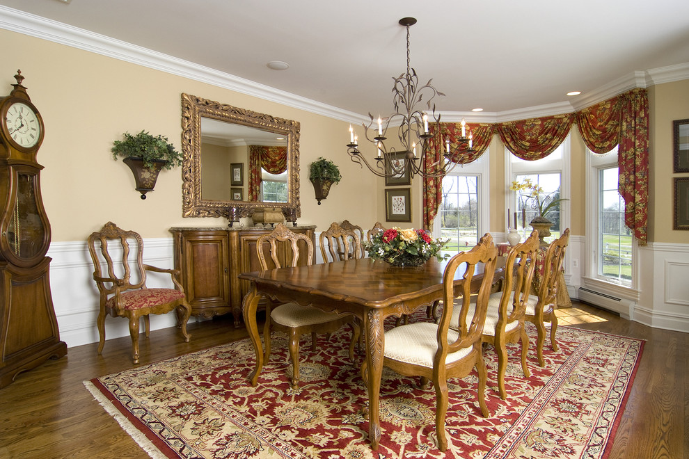 Photo of a classic dining room in Newark with beige walls and dark hardwood flooring.