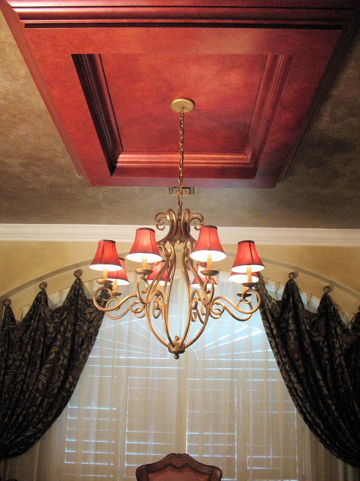 Example of a tuscan dining room design in Las Vegas