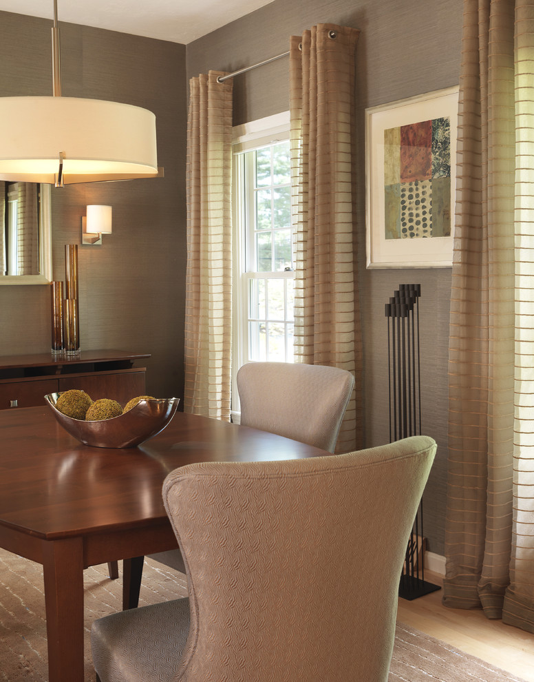Design ideas for a classic dining room in Boston with brown walls and medium hardwood flooring.