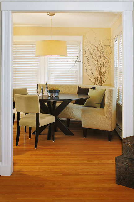 Minimalist medium tone wood floor dining room photo in Boston with yellow walls and no fireplace