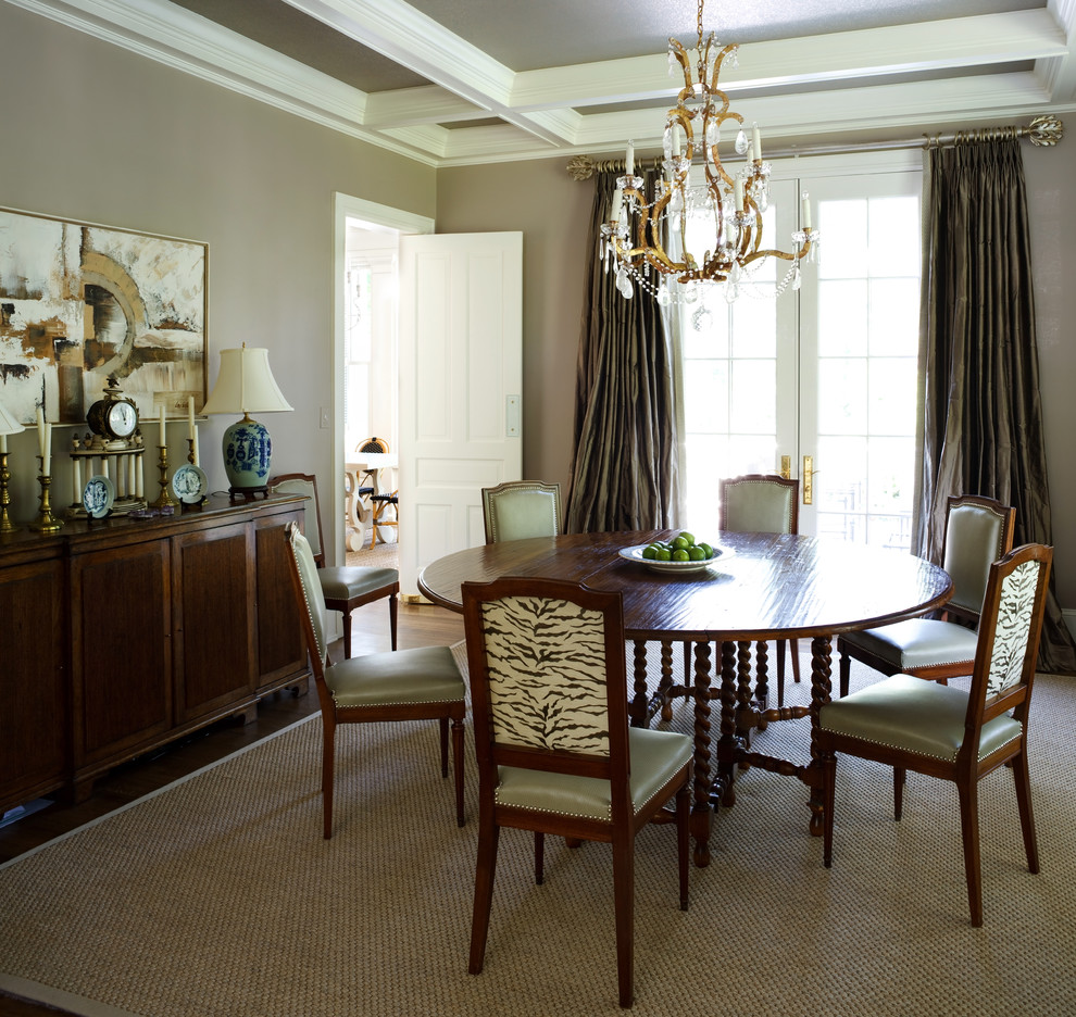 This is an example of a classic enclosed dining room in DC Metro with grey walls.