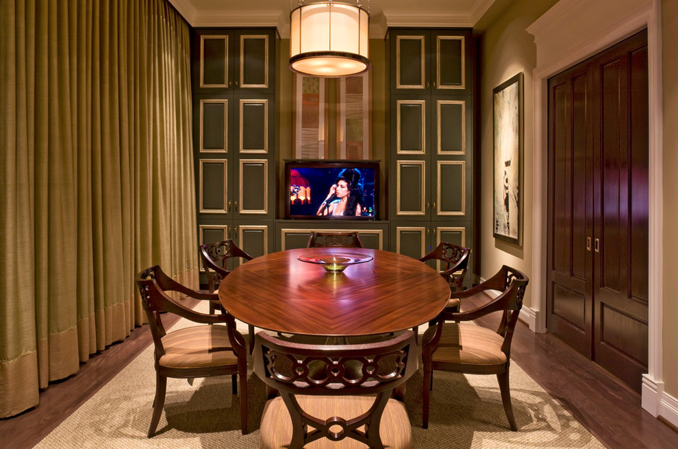 Elegant dark wood floor enclosed dining room photo in Baltimore with beige walls